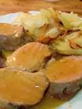 Solomillo de cerdo con zumo de mandarina al horno