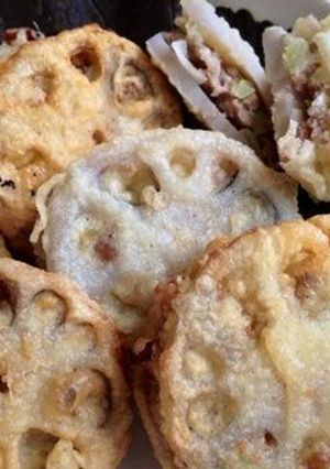 A picture of Lotus Root Tempura Stuffed with Pork.