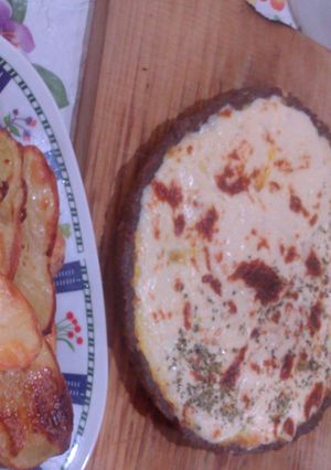 Una foto de TARHAMPI al queso con papas al horno