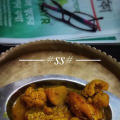 A picture of Gurjali fish with Cauliflower curry.