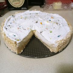 A picture of Frootloop Protein Rice Krispy Treat Cheesecake.