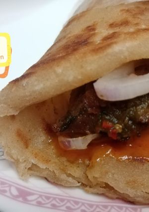 A picture of Shami kabab roll paratha.