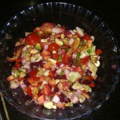 A picture of Dry fruits and veggies salad.