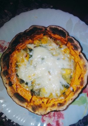 Una foto de Zapallo anco relleno de choclo puerro,cebolla de verdeo y queso!
