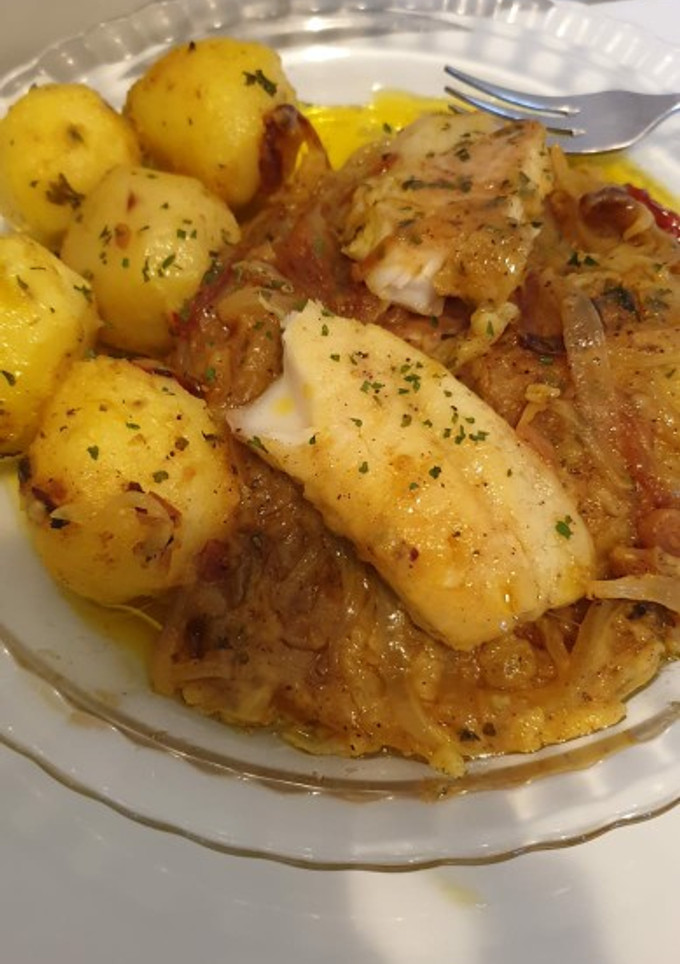 Una foto de Pescados encebollados al curry
