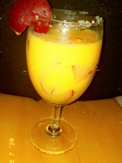 A picture of Mango shake with Plum Plum #mangomasti.