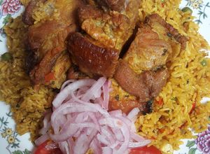 Una foto de Arroz con chancho (Pork)🇵🇪