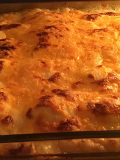 Una foto de Huevos rellenos gratinados a los cuatro quesos con mostaza de Dijon