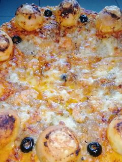 صورة لوصفة بيتزا بالكريم فريش وشكل جديد