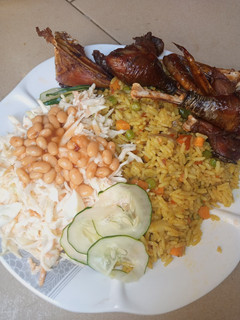 A picture of Fried rice and coleslow.
