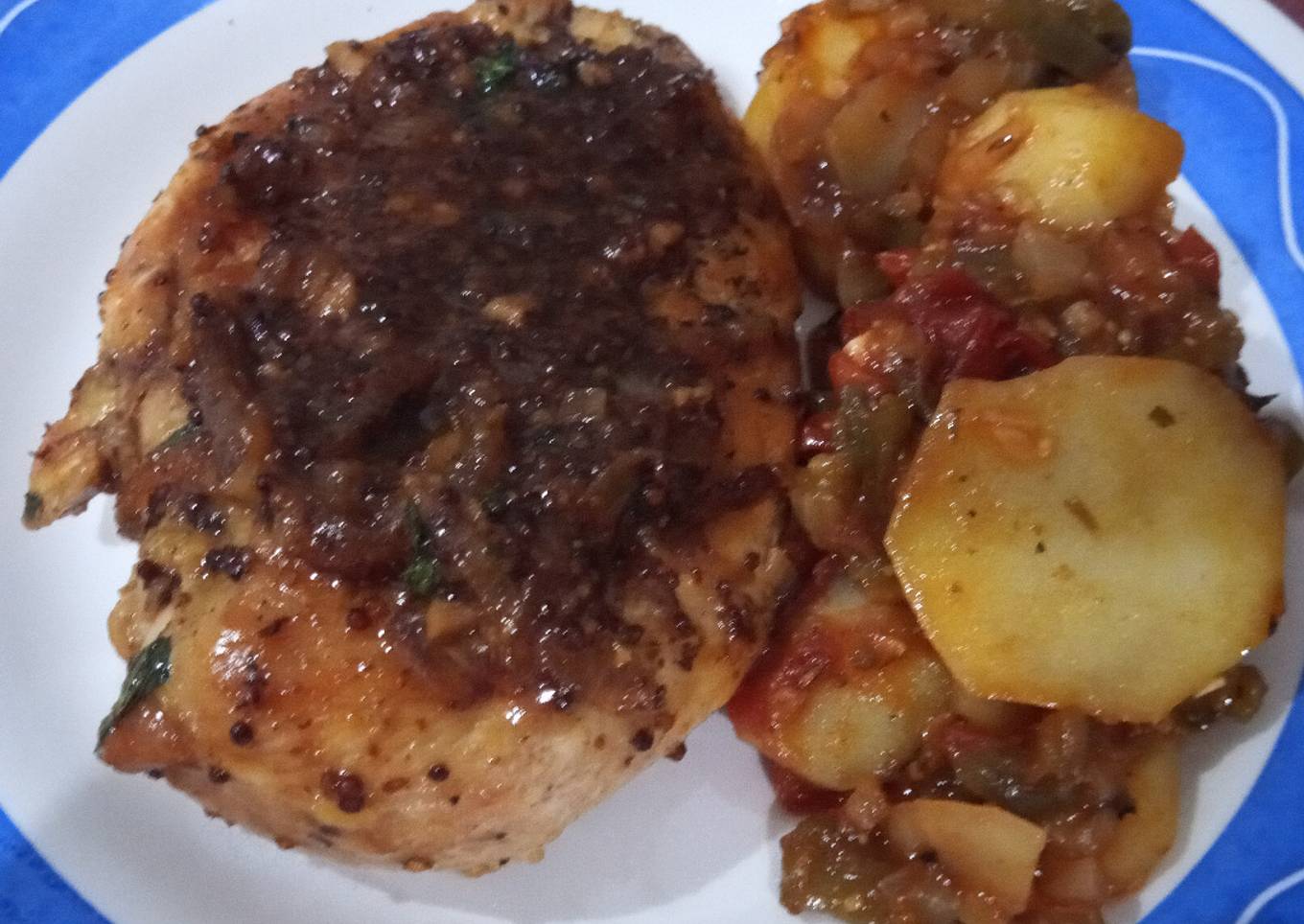 Pechugas de pollo a la salsa de cerveza, mostaza y miel con patatas a lo pobre