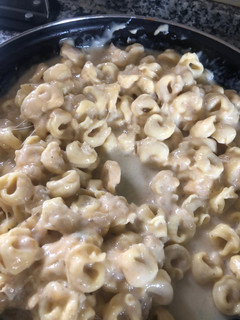Una foto de Tortellini en salsa de queso