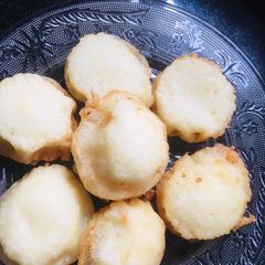 A picture of Ground rice white raw rice paniyaram.