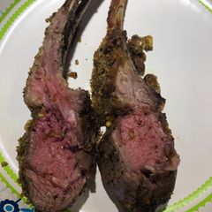 A picture of Holiday French Rack of Lamb with a Pistachio Crust 🐑.