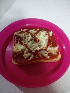 Una foto de Mini pizza con pan de molde