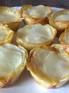 Una foto de Cestitos de patata y bacon