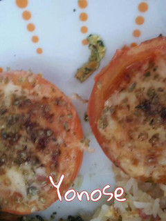 Una foto de Tomates pizza