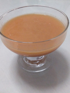 Una foto de Zumo papaya y granada