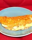 Omelette de salame, jamón y queso