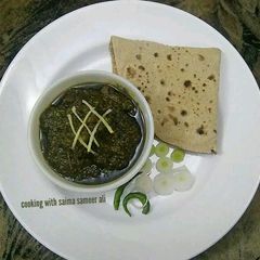 A picture of Daigi palak gosht.