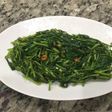 Stir fried water spinach炒空心菜