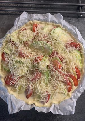Une photo de Quiche tomates courgettes