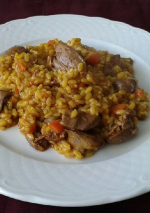 Una foto de Arroz meloso con higaditos de pollo