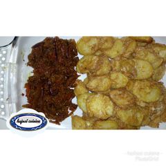 A picture of Pried Potato in egg and mince meat soup.