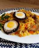 Arroz con muslitos de codorniz y champiñones