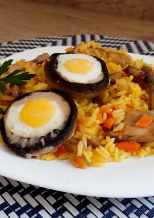 Foto principal de Arroz con muslitos de codorniz y champiñones