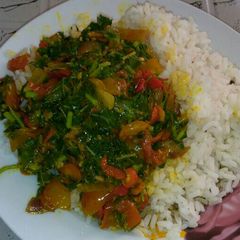 A picture of Ofada Rice with vegetable sauce.