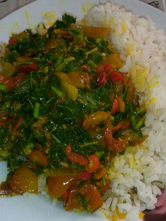 A picture of Ofada Rice with vegetable sauce.
