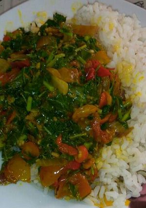 A picture of Ofada Rice with vegetable sauce.