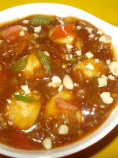 A picture of Steamed Tofu Balls in hot and sweet sauce.