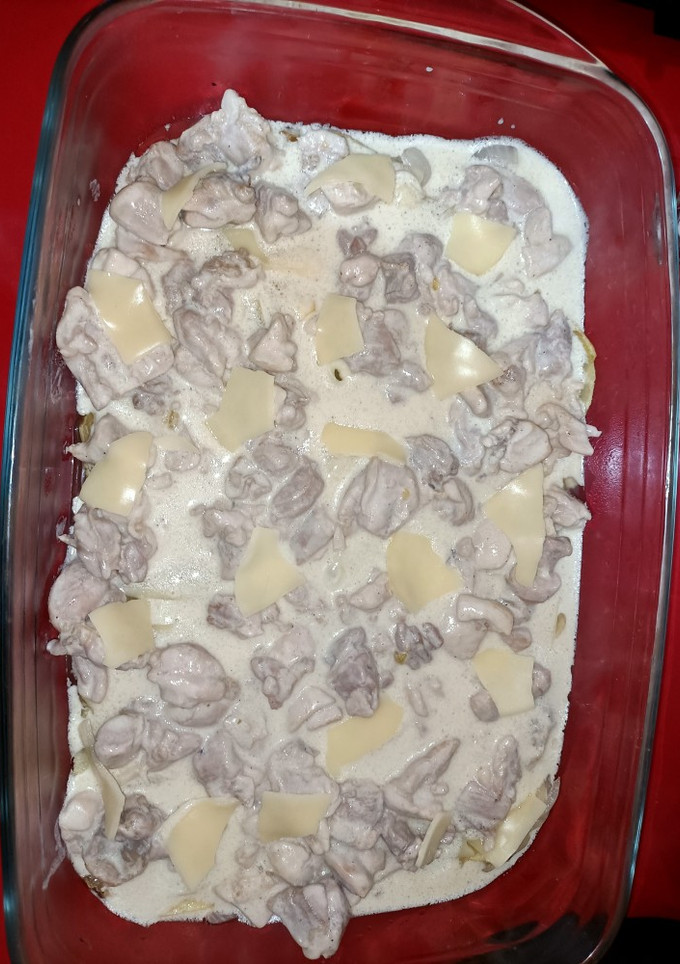 Una foto de Solomillo de pollo con nata, patatas y queso