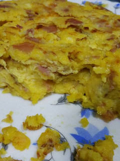 Una foto de Tortilla de J.york, Queso rallado (Mozzarella) y Nata