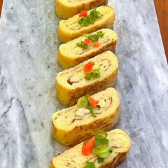 A picture of Tamagoyaki (Japanese Omelette).