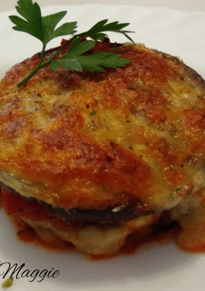 Una foto de Berenjenas a la parmesana