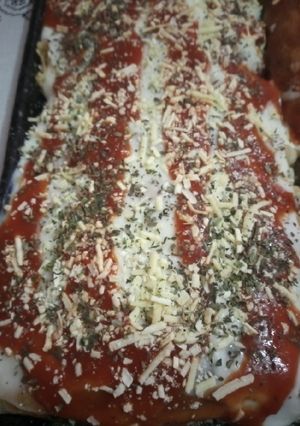 Una foto de Canelones de carne de cerdo pollo y espinacas