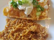 A picture of chicken enchiladas with rotel