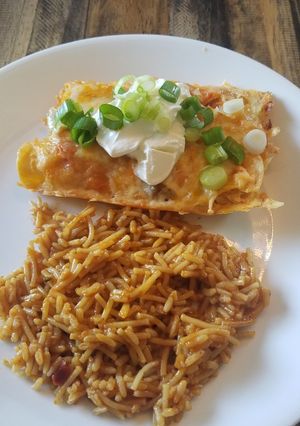 A picture of Baked Chicken Enchiladas.
