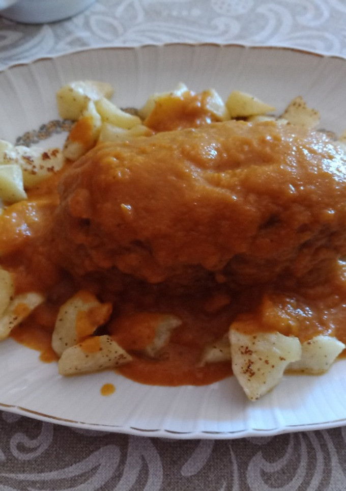 Una foto de Rollo de carne con salsa de verduras