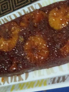 Una foto de Queque chocolate caramelo naranja