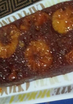 Una foto de Queque chocolate caramelo naranja