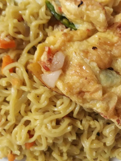 A picture of Indomine with fried egg.