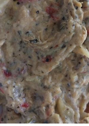 Une photo de Effiloché de merlu aux champignons tomates et crème