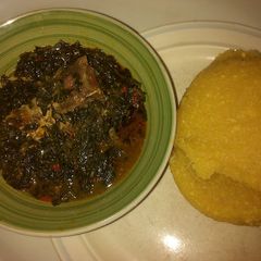 A picture of Eba with vegetables soup.