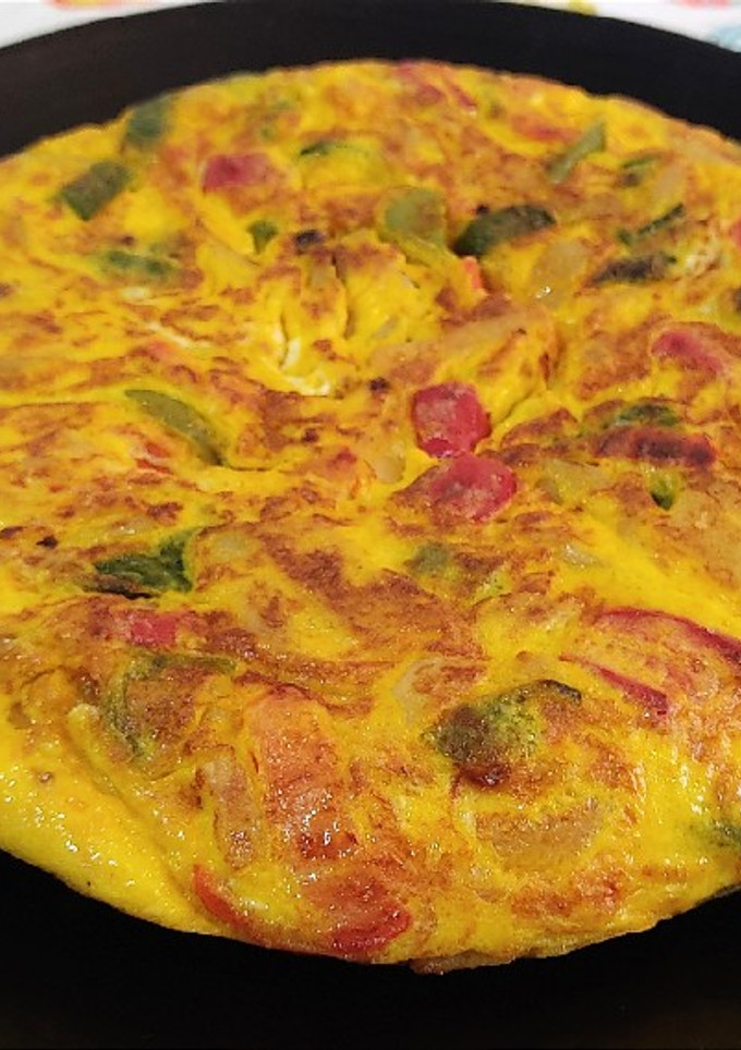 Una foto de Tortilla de patata y pimientos