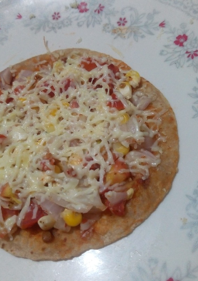 રોટી પીઝા(Roti Pizza Recipe In Gujarati) રેસીપી મુખ્ય ફોટો