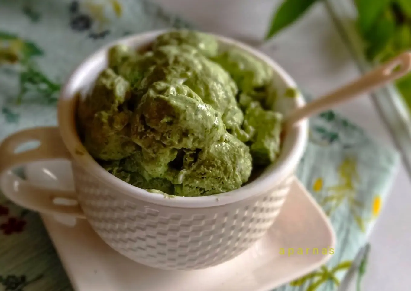 Green Tea Froyo with a spoon.